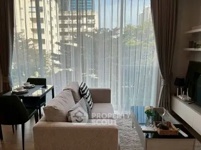 Modern living room with large windows and stylish decor in urban apartment