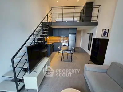 Modern loft apartment with sleek kitchen and stylish mezzanine bedroom