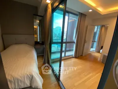 Modern bedroom with balcony view in urban apartment