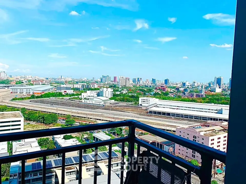 Stunning cityscape view from a high-rise balcony, perfect for urban living enthusiasts.
