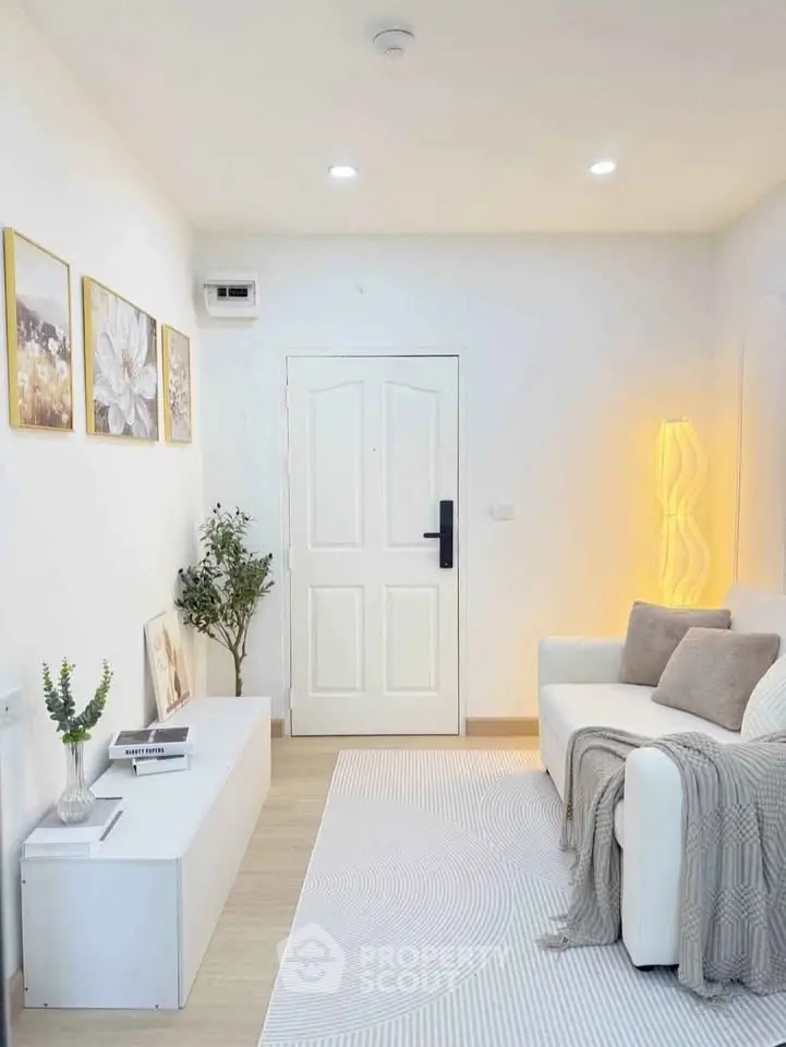 Chic modern living room with cozy white sofa and elegant decor