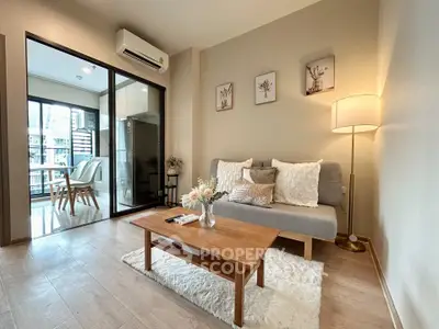 Modern living room with cozy sofa, wooden coffee table, and stylish decor in a bright apartment.
