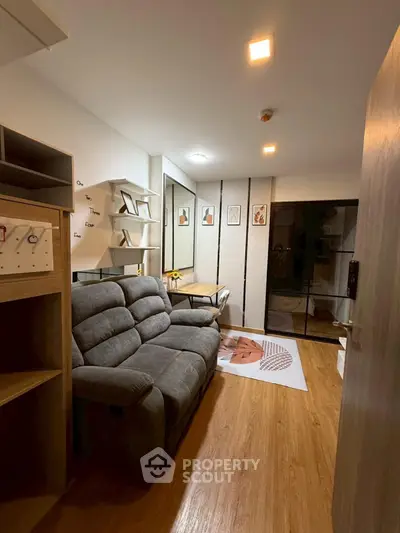 Cozy living room with modern decor and comfortable seating