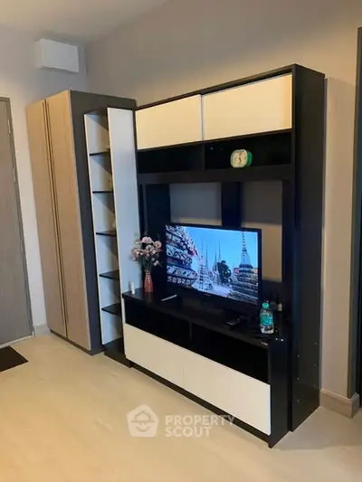 Modern living room with sleek TV stand and storage unit