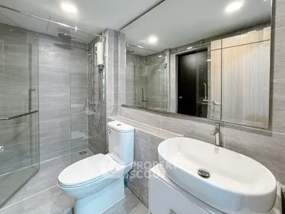 Modern bathroom with sleek design and glass shower enclosure
