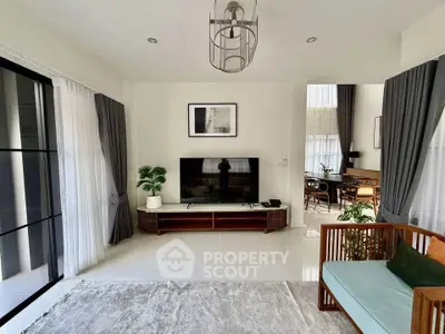 Spacious modern living room with elegant decor and natural light