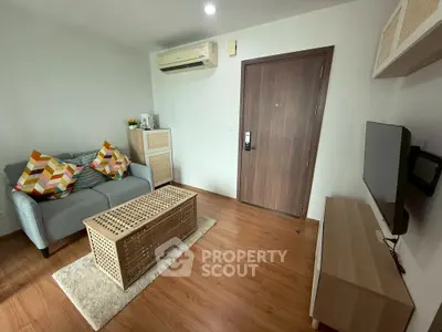 Cozy living room with modern decor and wooden flooring