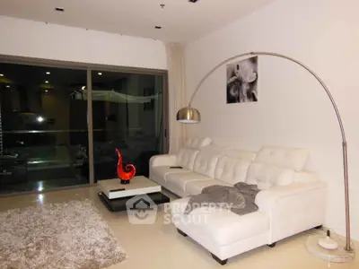Luxurious modern living room with white leather sofa and elegant decor