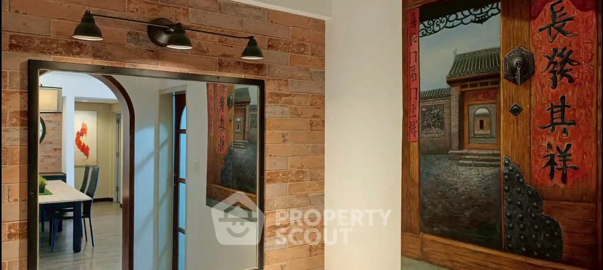 Stylish interior with brick wall and artistic decor in modern home