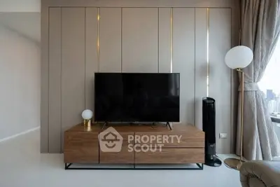 Modern living room with sleek TV unit and stylish decor