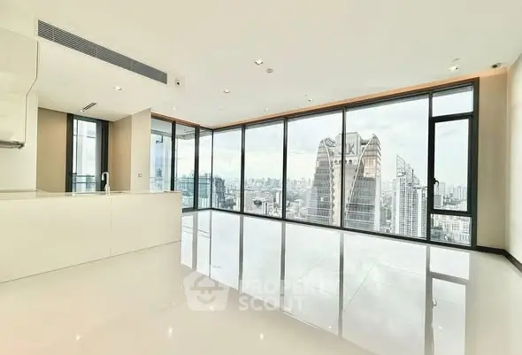 Luxurious high-rise apartment with panoramic city skyline views and sleek modern interior.
