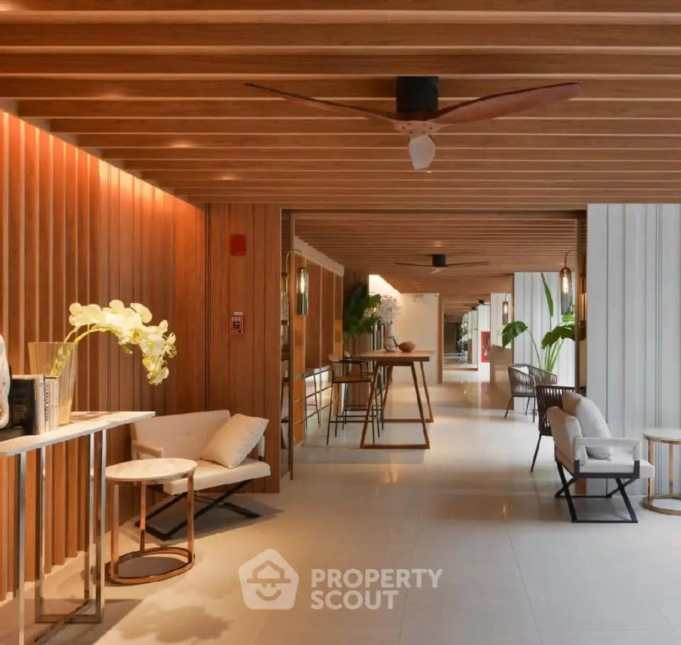 Luxurious modern lobby with elegant wooden accents and stylish seating area