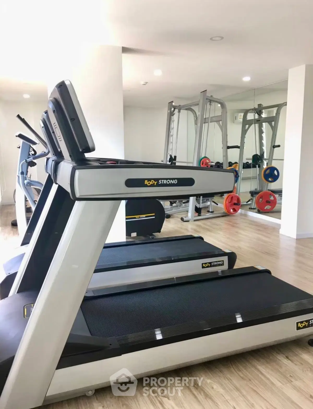 Modern gym with state-of-the-art equipment in a residential building