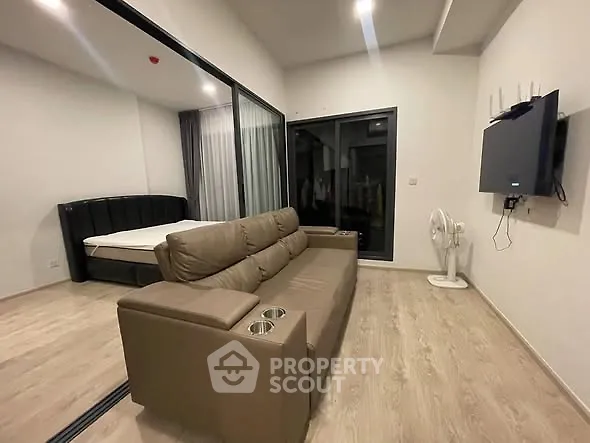 Modern studio apartment with sleek design and cozy furnishings