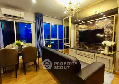 Luxurious living room with elegant decor and stunning night view