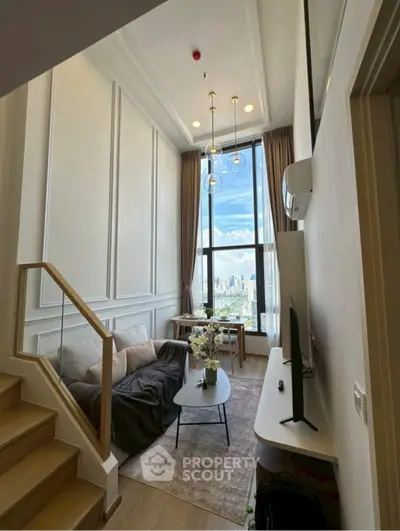 Luxurious high-ceiling living room with stunning city view and elegant decor