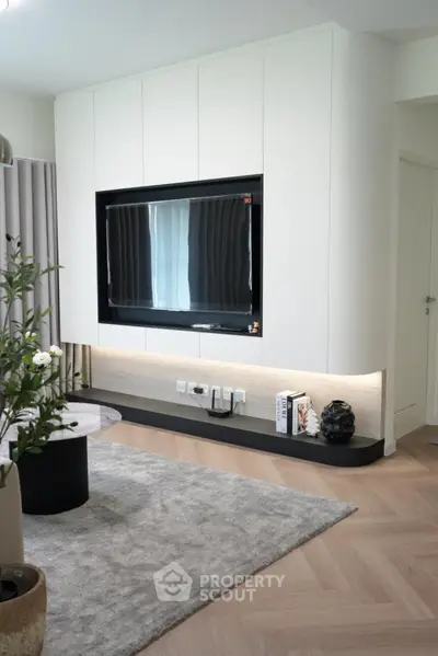 Modern living room with sleek TV unit and stylish decor