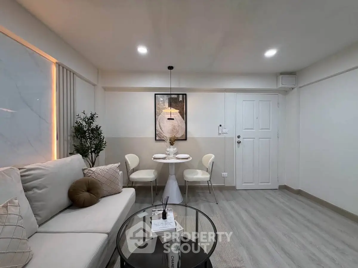 Modern living room with stylish decor and cozy seating area