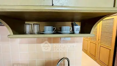 Charming kitchen with open shelving and stylish dishware
