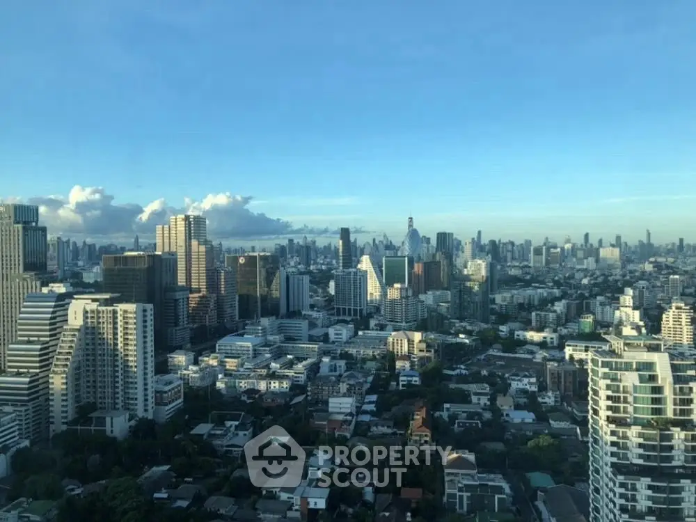 Stunning cityscape view from a high-rise building showcasing urban skyline and architecture.
