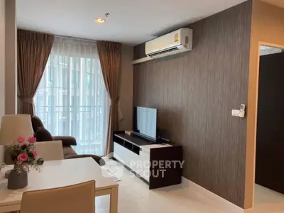 Modern living room with air conditioning and stylish decor in a cozy apartment.