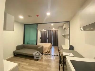 Modern studio apartment with open layout and stylish furnishings