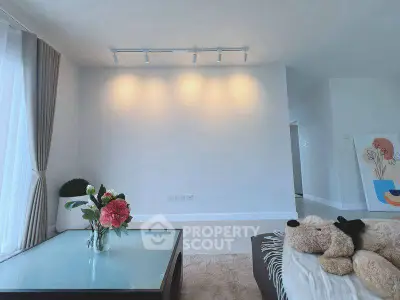 Modern living room with cozy decor and natural light