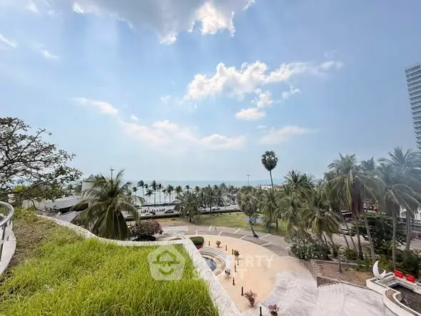 Stunning ocean view from a lush rooftop garden in a tropical setting.