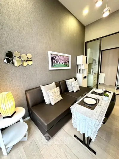 Modern living room with stylish decor and open kitchen layout