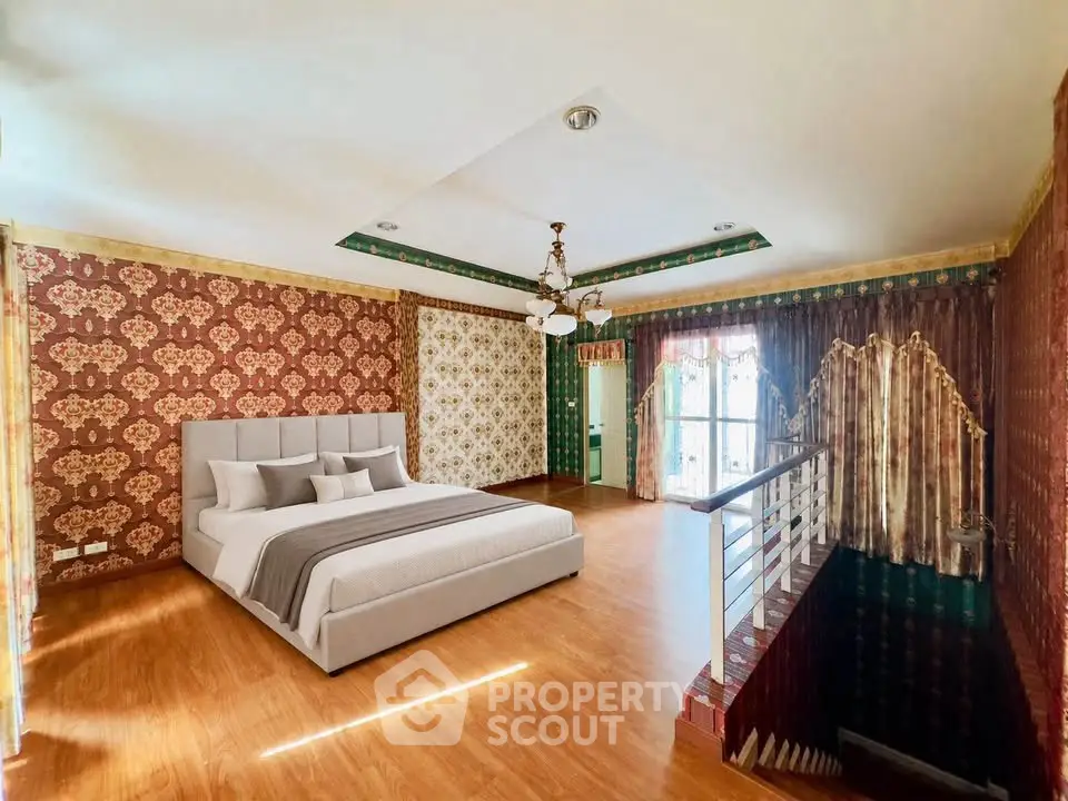 Luxurious bedroom with elegant wallpaper and stylish ceiling design, featuring a cozy bed and natural light.