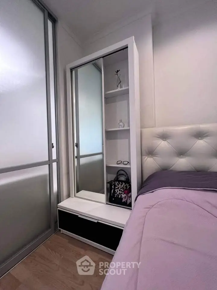 Cozy bedroom with modern wardrobe and stylish decor