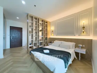 Luxurious modern bedroom with elegant decor and ambient lighting, perfect for relaxation and comfort.