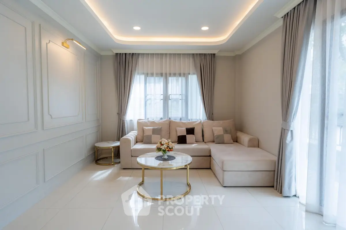 Elegant living room with plush sectional sofa and chic decor