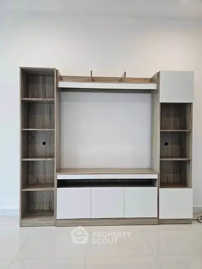 Modern minimalist entertainment unit with open shelving and sleek design