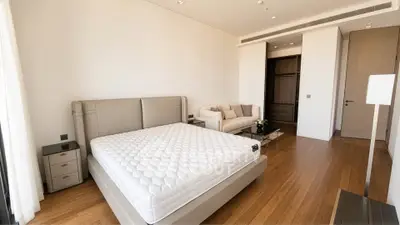 Luxurious bedroom with modern furnishings and spacious layout