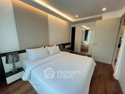 Luxurious modern bedroom with elegant decor and wooden flooring