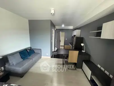 Modern living room with sleek furniture and neutral tones, perfect for urban living.