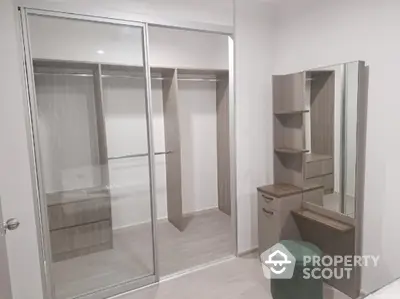 Spacious walk-in closet with modern design and ample storage space