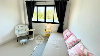 Cozy living room with stylish decor and natural light