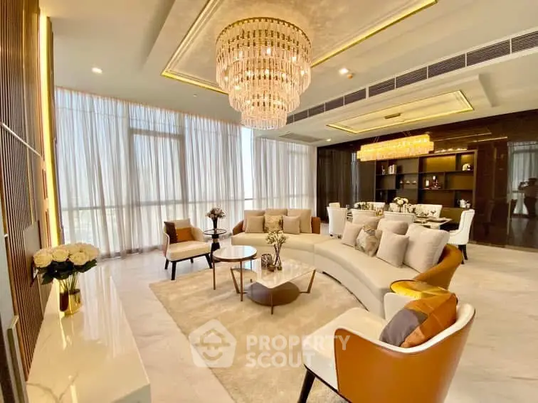 Luxurious living room with elegant chandelier and modern decor