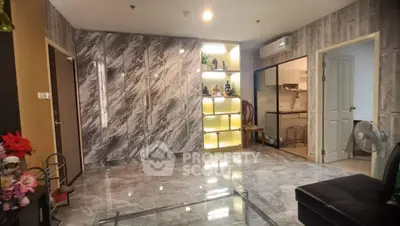 Luxurious marble-finished living room with modern decor and open layout