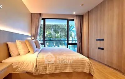 Luxurious bedroom with large window and palm tree view, elegant design and cozy ambiance.