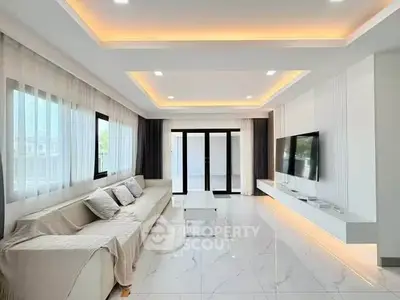 Luxurious modern living room with elegant lighting and spacious design