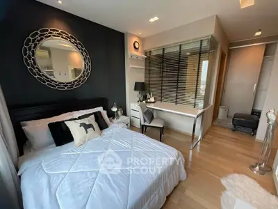 Luxurious modern bedroom with stylish decor and elegant furnishings, featuring a cozy bed and a chic workspace.
