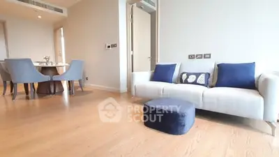 Modern living room with elegant dining area and stylish decor