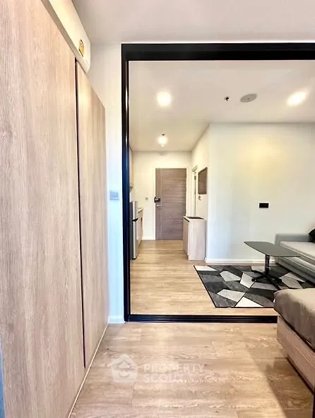 Modern apartment interior with wooden flooring and stylish furniture