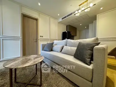Modern living room with stylish sofa and elegant lighting