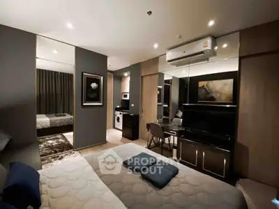 Modern bedroom with stylish decor and in-room amenities