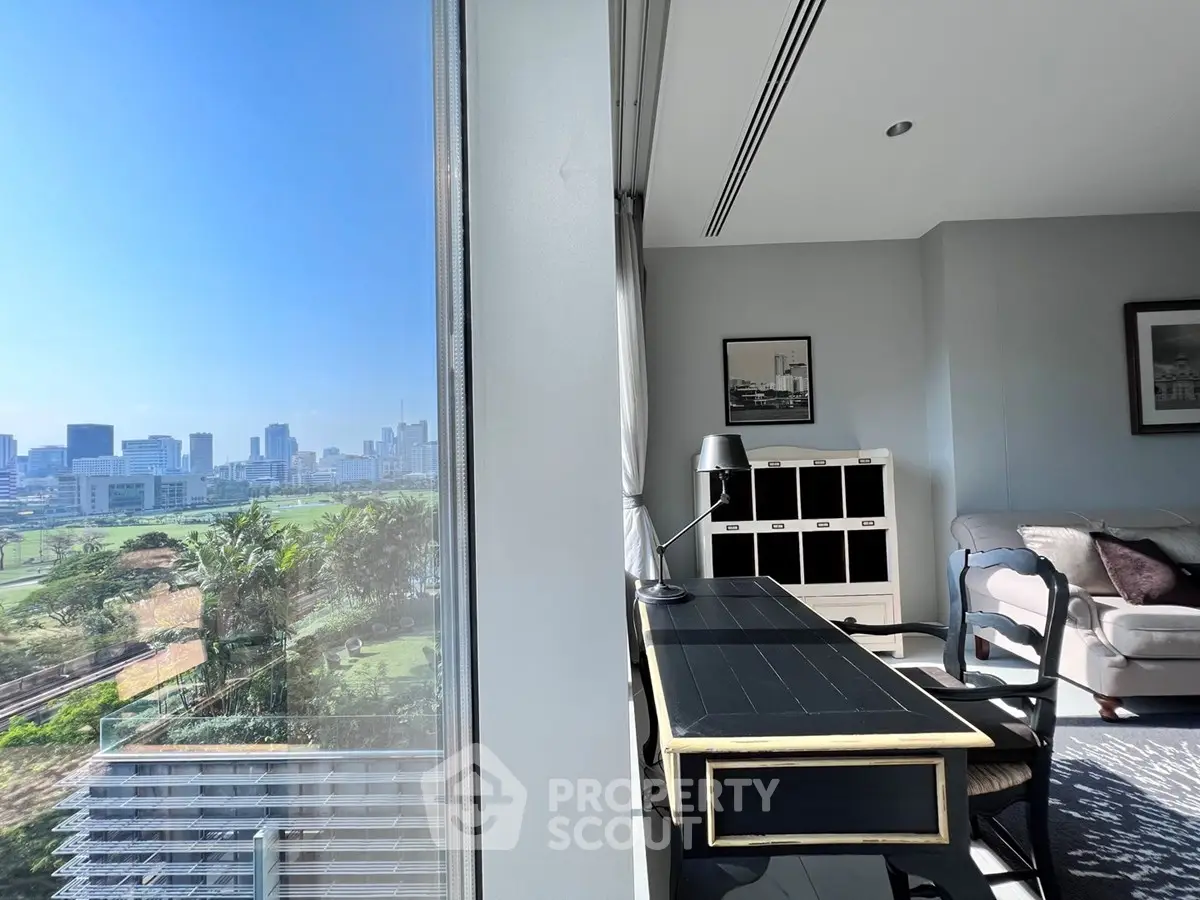 Modern living room with city view and stylish furniture, perfect for urban living.