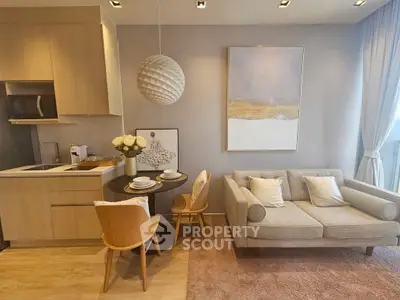 Modern living room with cozy sofa, dining area, and stylish decor